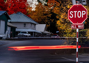 What is a solar-powered LED flashing stop sign